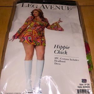 New in Package Hippie Chick Plus Size Costume. Size 1X-2X